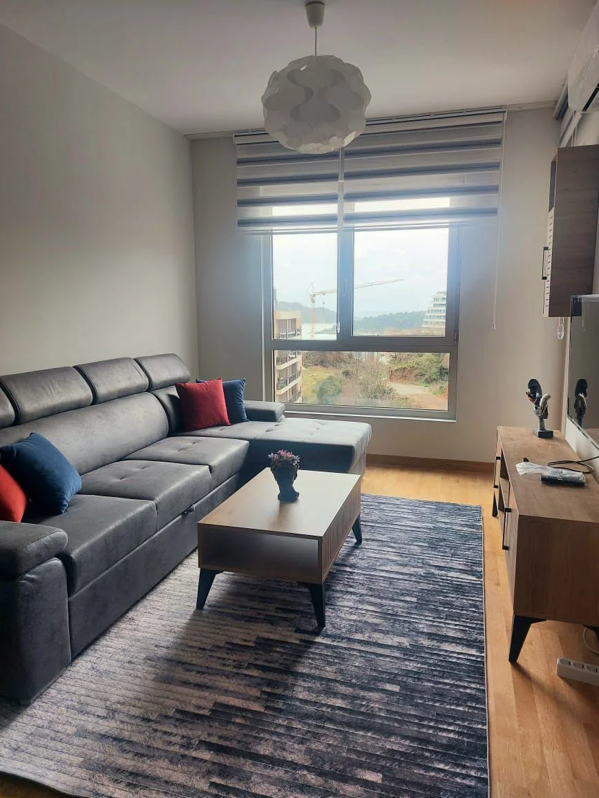 1+1 Annual rental apartment with sea view in Becici