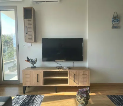 1+1 Annual rental apartment with sea view in Becici